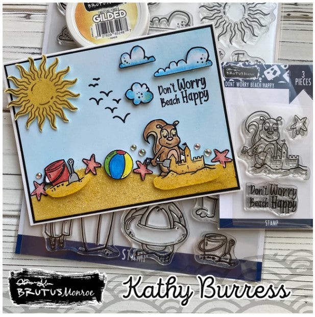 Brutus Monroe - 6x8 Stamp Set - Beach Bum. This 17 piece stamp set is includes scenery, sentiments and adorable characters ready to hit the beach. This set is perfectly sized to create tags, cards and layouts. Available at Embellish Away located in Bowmanville Ontario Canada. Card design by Kathy Burress