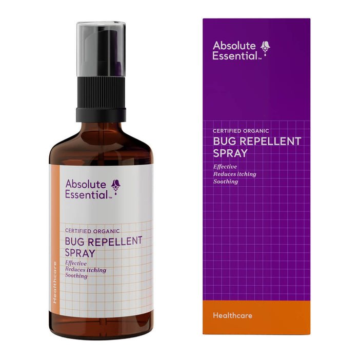 Bug repellent spray bottle and packaging with 'Absolute Essential' branding on a white background.