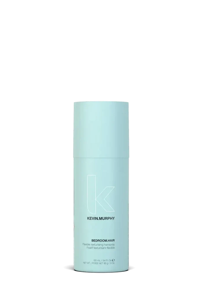 Blue hair product bottle with Kevin Murphy branding on a white - Hair Care Canada