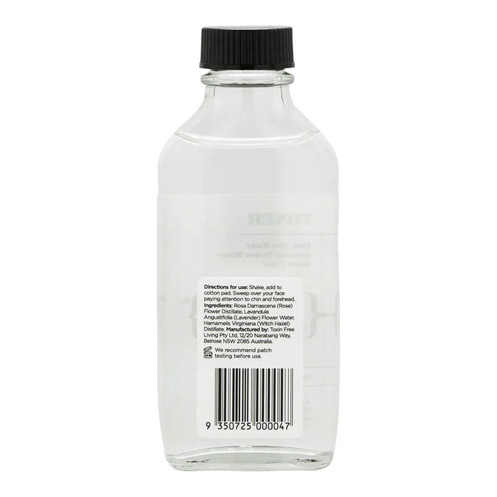 Clear bottle with black cap on a white background