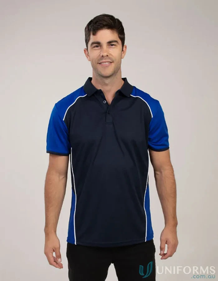 Man wearing McPherson Polo in navy and blue, made with recycled fibres for cooldry moisture management